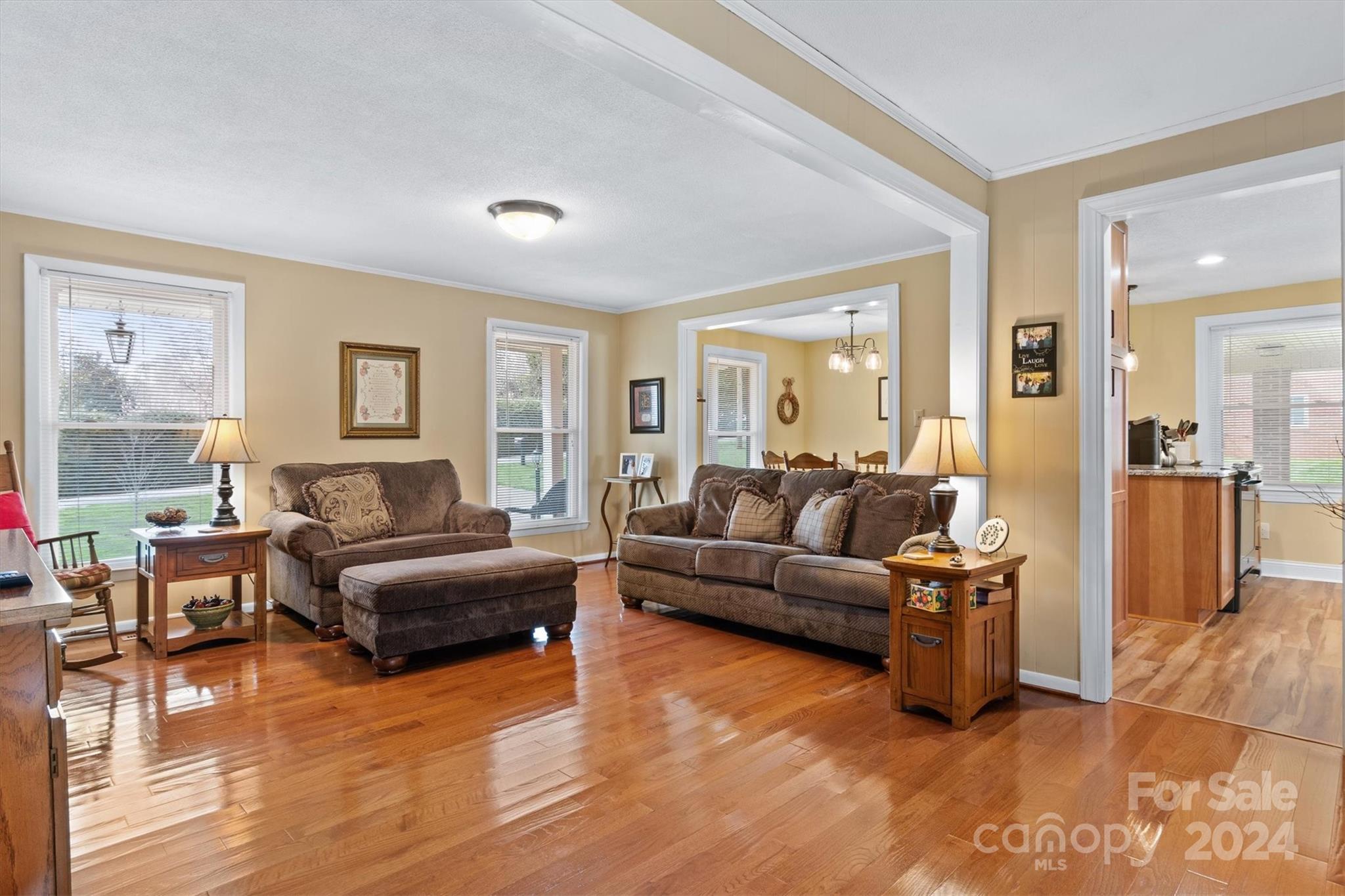 215 6th Street Northeast Conover, NC 28613 - Photo 7 of 47 a living room with furniture and a large window