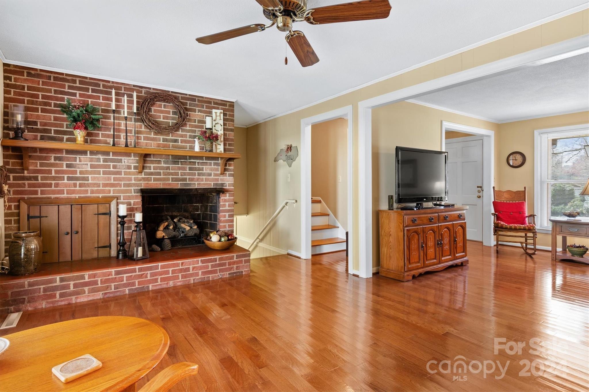 215 6th Street Northeast Conover, NC 28613 - Photo 9 of 47 a living room with furniture and a fireplace