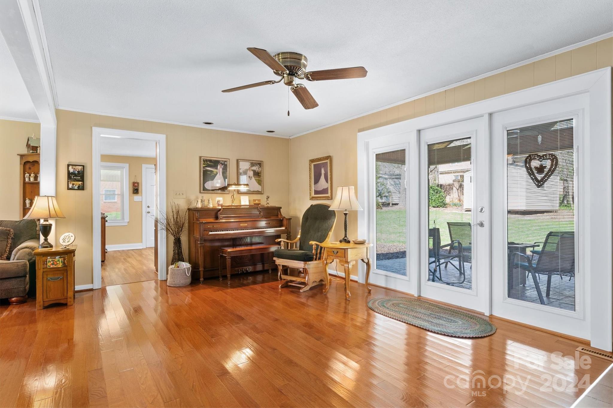 215 6th Street Northeast Conover, NC 28613 - Photo 10 of 47 a living room with furniture and wooden floor