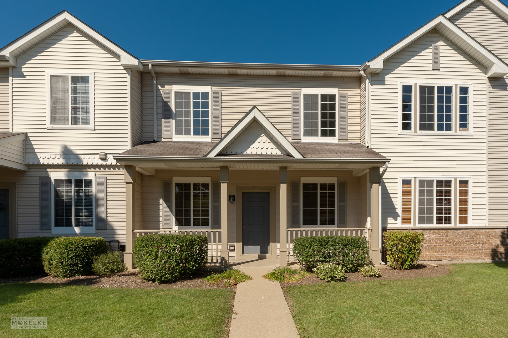 123 Yarrow Court Romeoville, IL 60446 - Photo 1 of 21 a front view of a house with a yard
