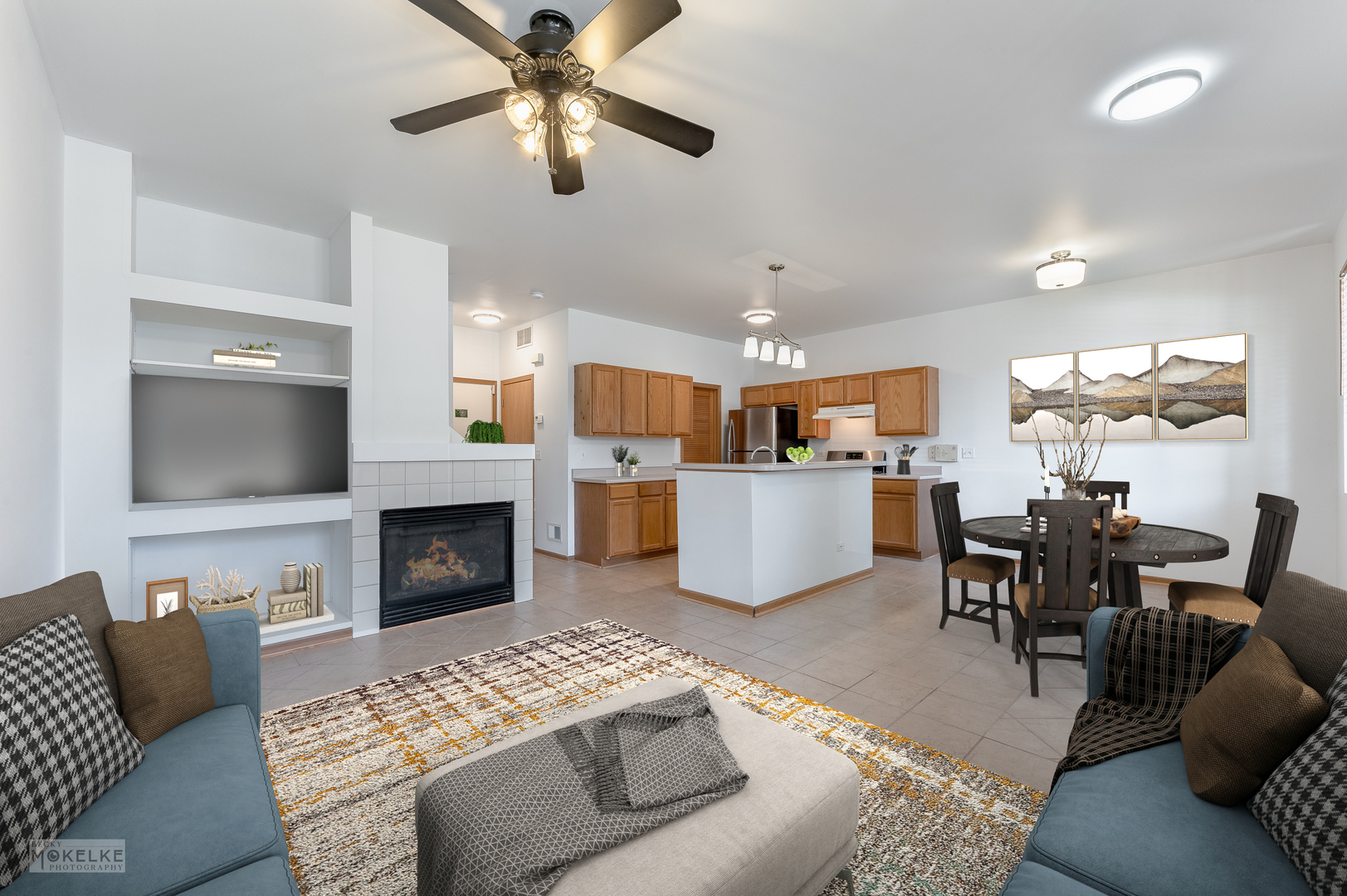 123 Yarrow Court Romeoville, IL 60446 - Photo 3 of 21 a living room with furniture kitchen view and a fireplace