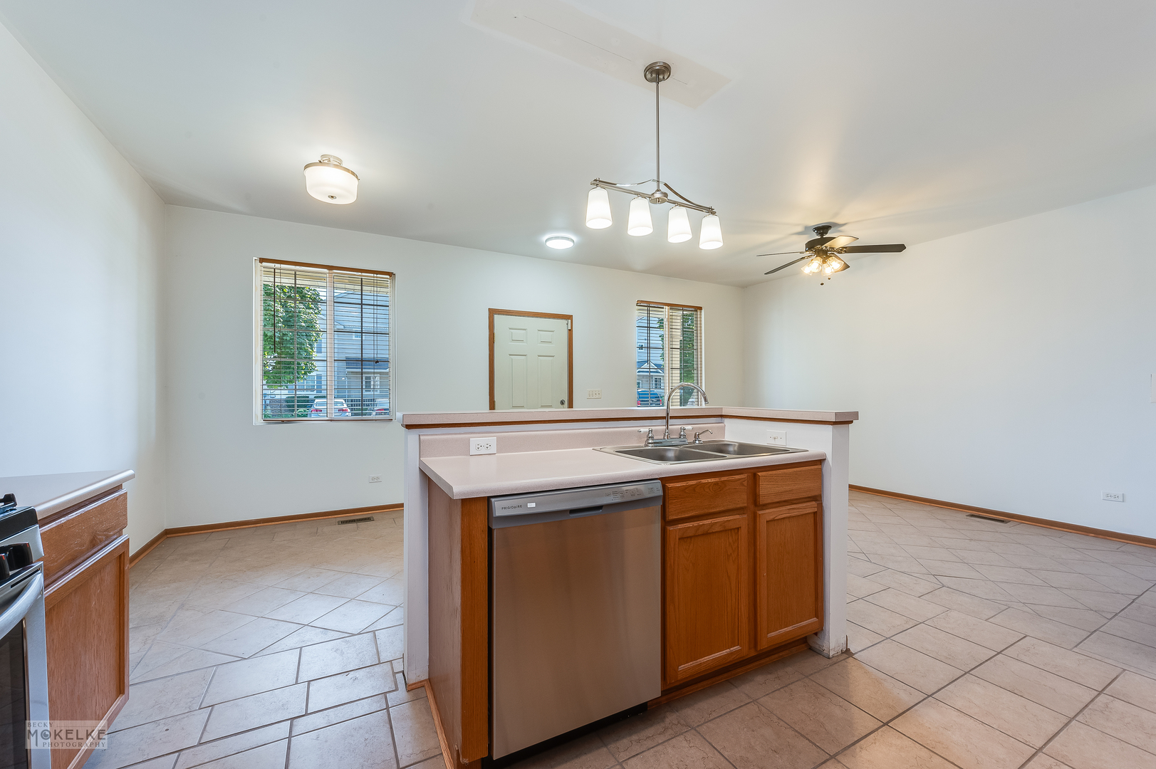 123 Yarrow Court Romeoville, IL 60446 - Photo 6 of 21 a view kitchen with a sink and chandelier