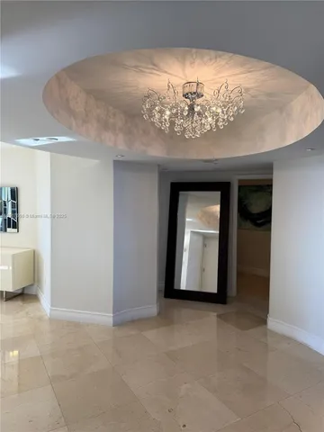 a view of a livingroom with a chandelier