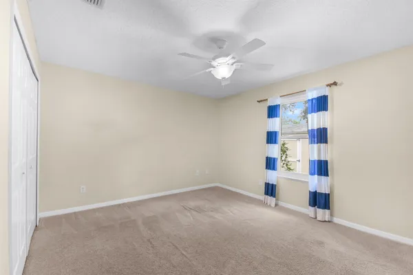 an empty room with shelves