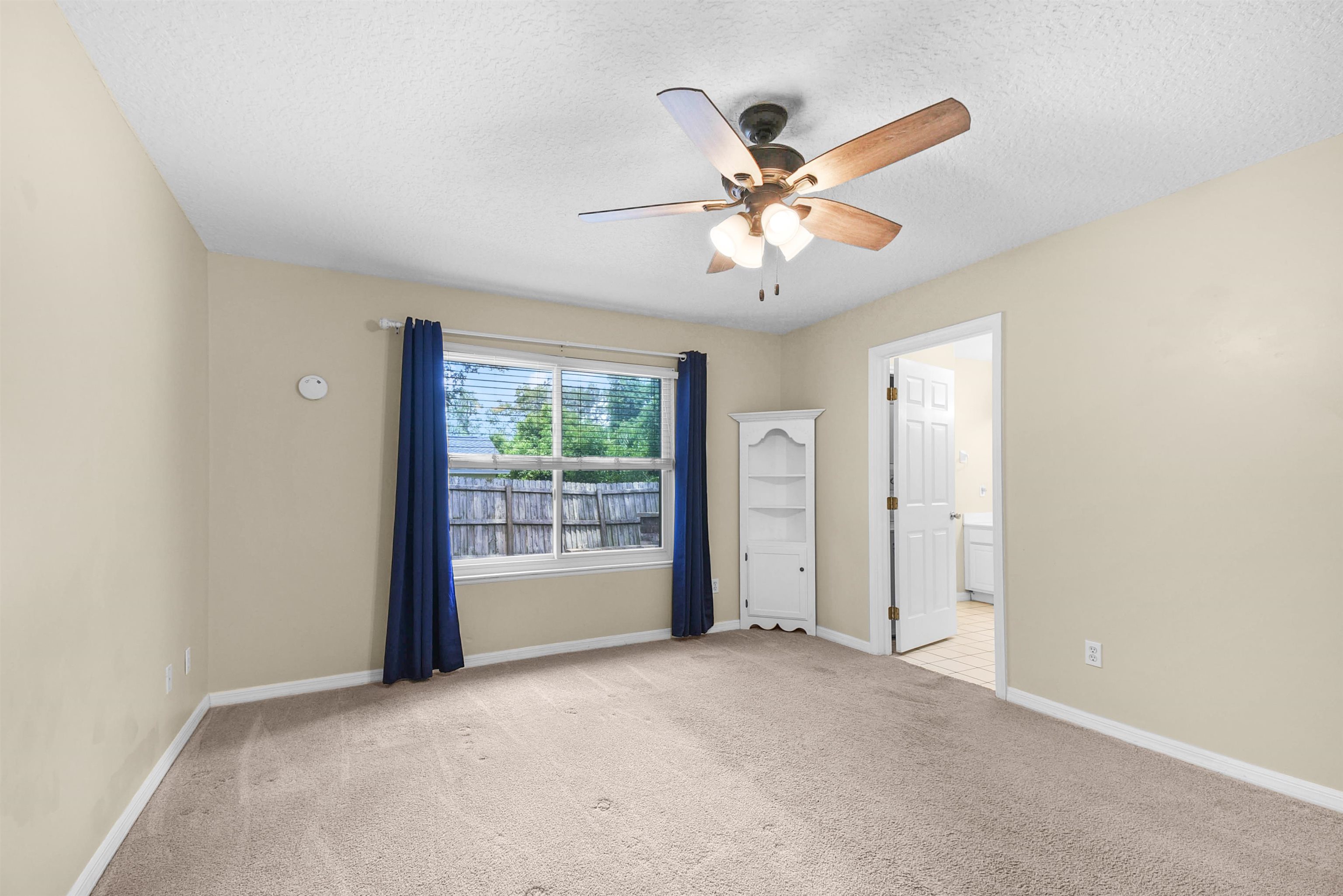 134 15th Street St. Augustine, FL 32080 - Photo 6 of 34 a view of an empty room with a window