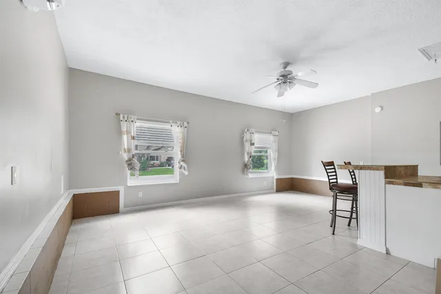 a view of livingroom with furniture and window