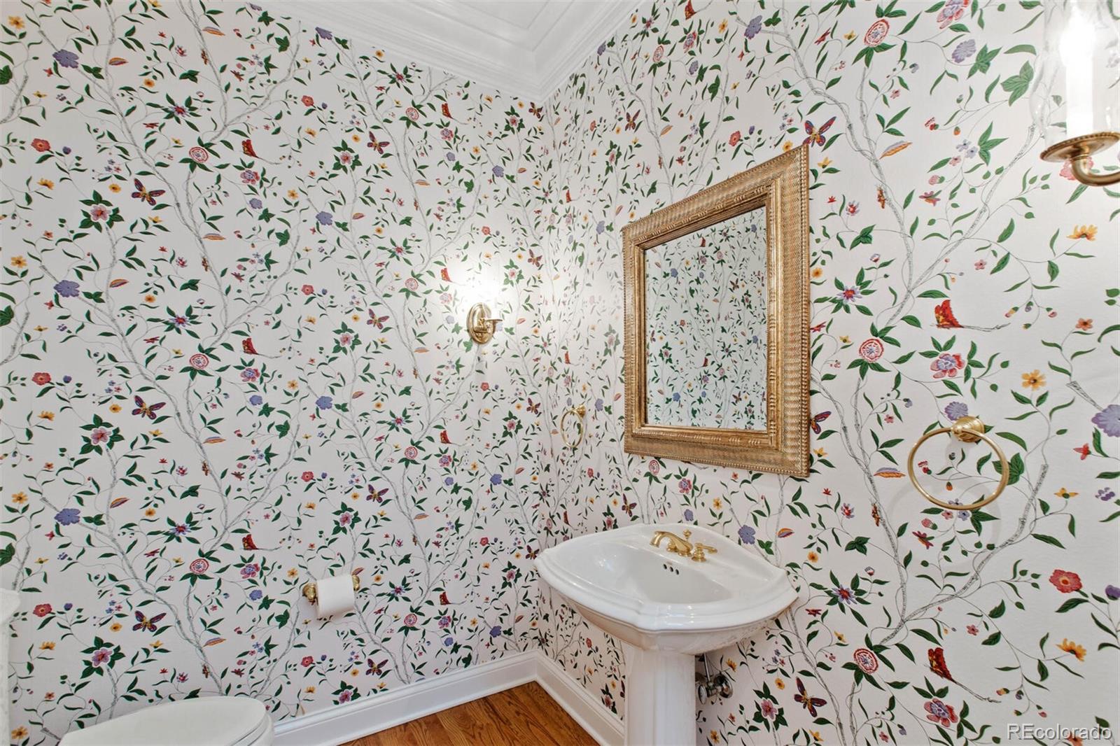 470 Monroe Street Denver, CO 80206 - Photo 20 of 40 a bathroom with a toilet and a sink