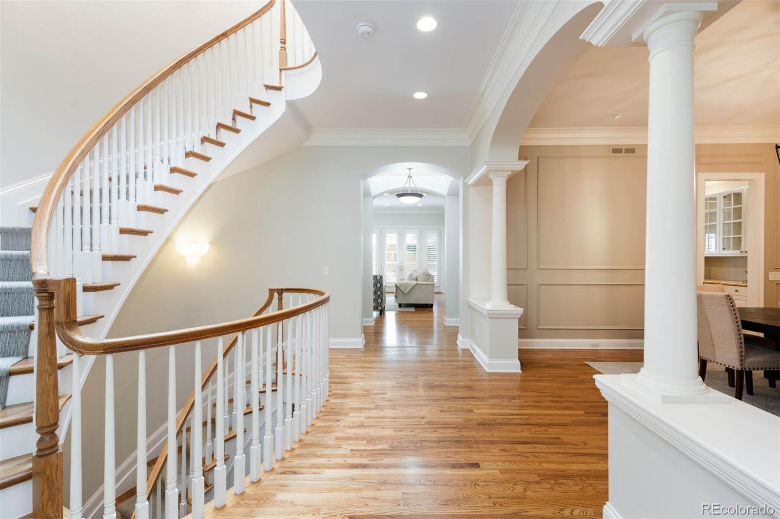 470 Monroe Street Denver, CO 80206 - Photo 2 of 40 a view of entryway and hall with wooden floor