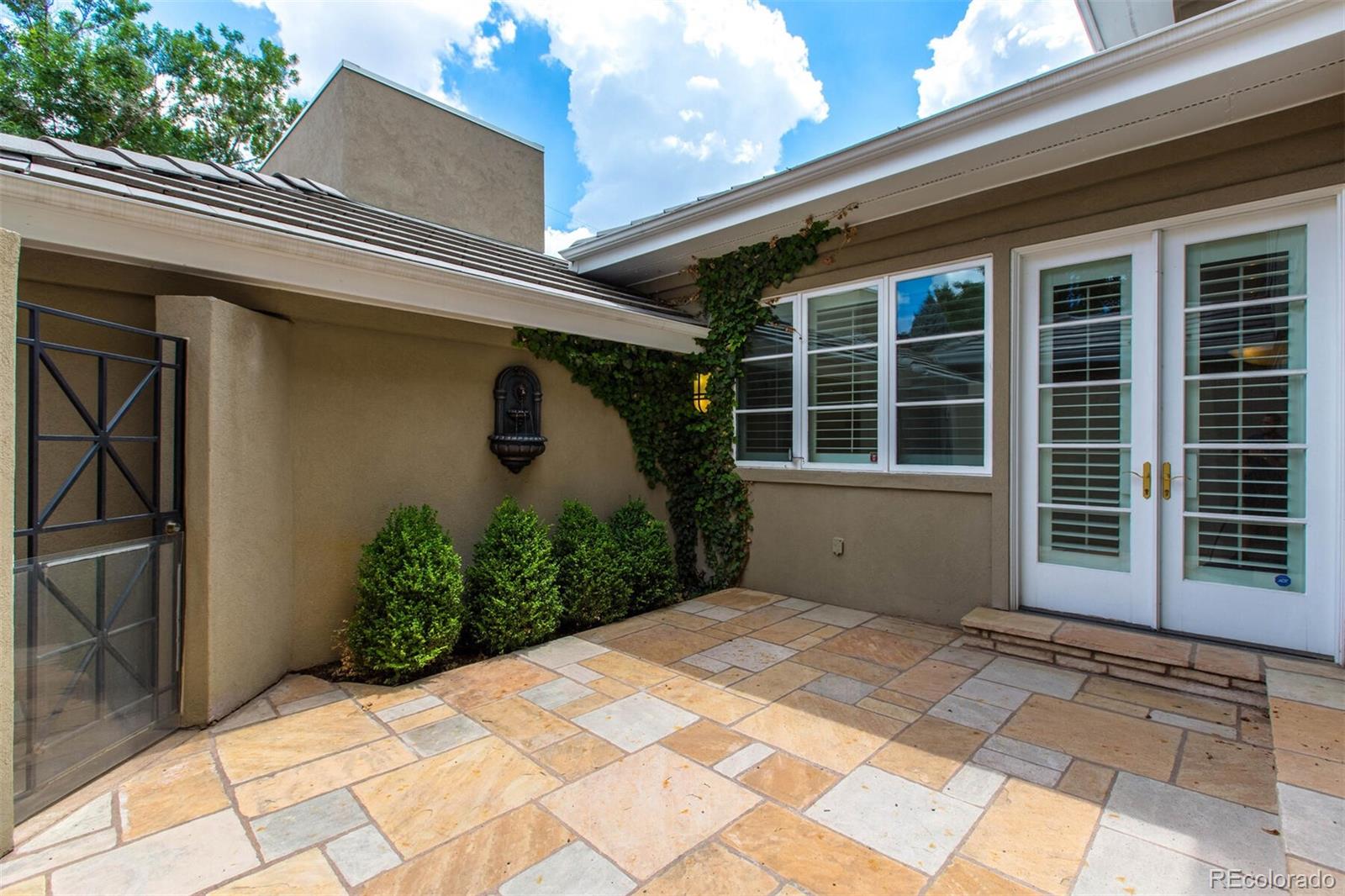 470 Monroe Street Denver, CO 80206 - Photo 23 of 40 a front view of a house