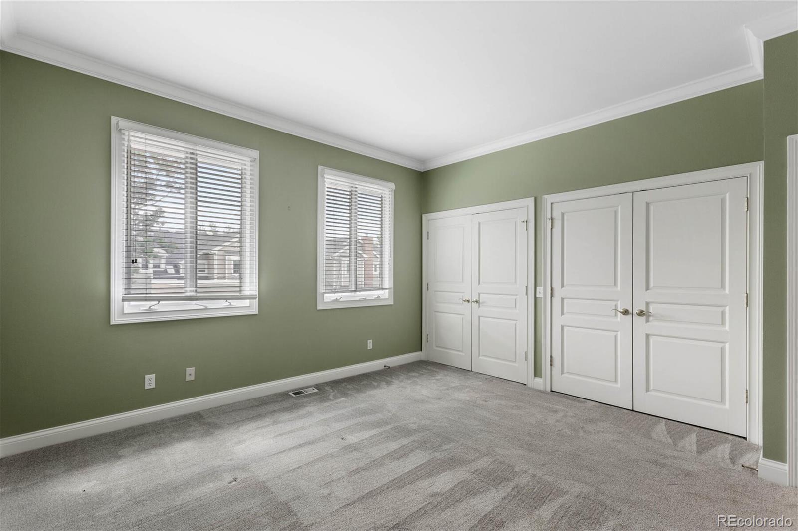470 Monroe Street Denver, CO 80206 - Photo 33 of 40 a view of an empty room with a window