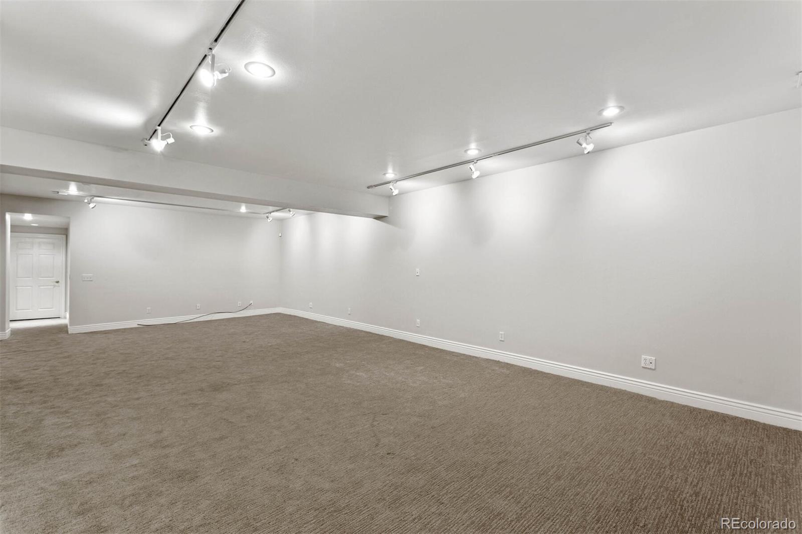 470 Monroe Street Denver, CO 80206 - Photo 36 of 40 an empty room with a empty space and windows