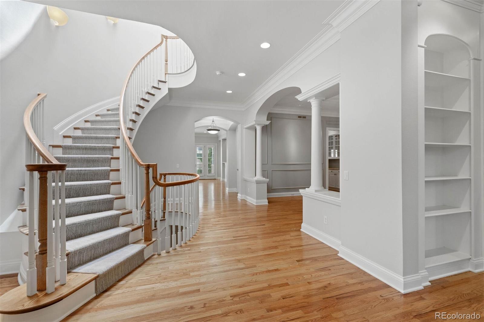 470 Monroe Street Denver, CO 80206 - Photo 39 of 40 a view of entryway and hall with wooden floor