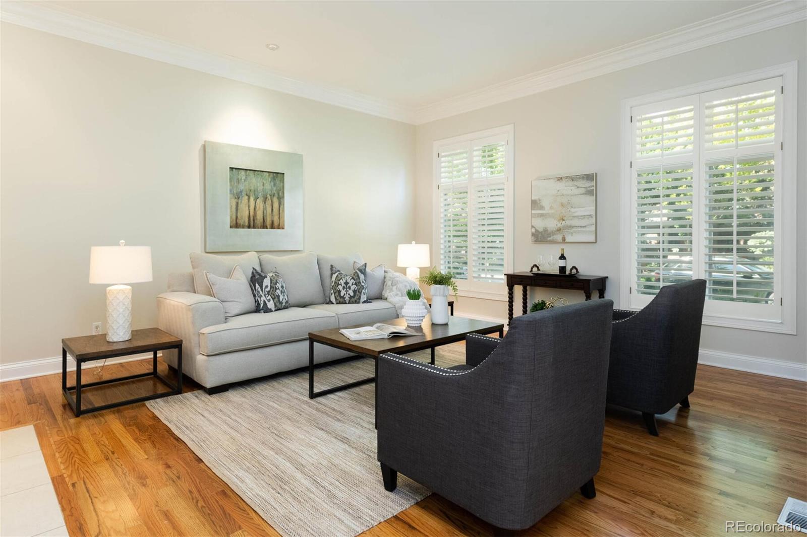 470 Monroe Street Denver, CO 80206 - Photo 4 of 40 a living room with furniture and a large window