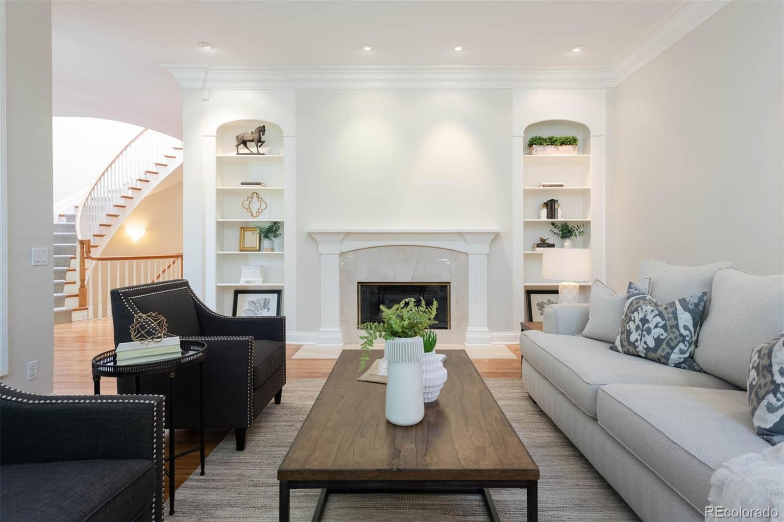 470 Monroe Street Denver, CO 80206 - Photo 5 of 40 a living room with furniture and a fireplace