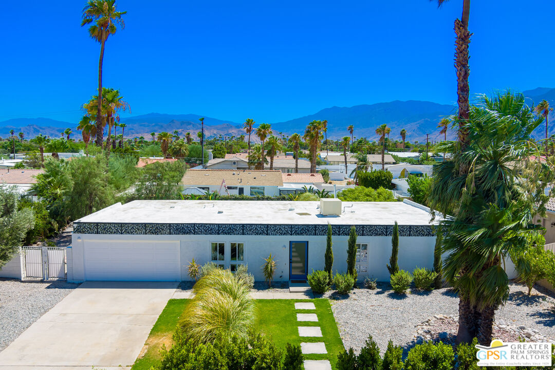 2405 East Francis Drive Palm Springs, CA 92262 - Photo 2 of 17 a view of a house with a patio