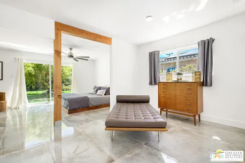 a living room with a couch and a table