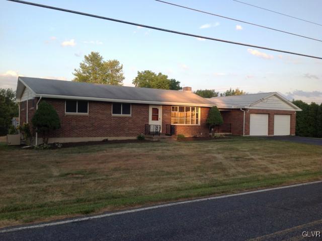 1230 Clearfield Road Nazareth, PA 18064 - Photo 1 of 20 a front view of a house with a yard