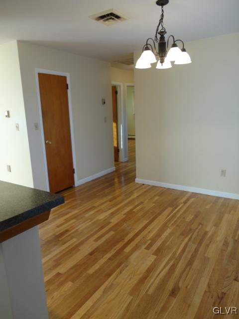 1230 Clearfield Road Nazareth, PA 18064 - Photo 12 of 20 a view of an empty room with a chandelier fan