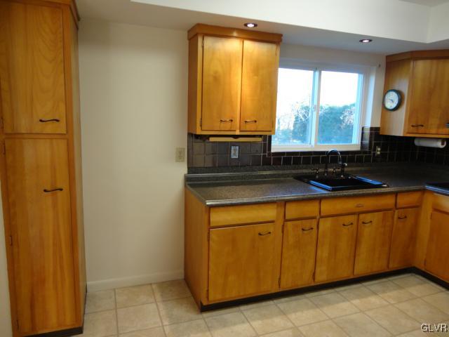 1230 Clearfield Road Nazareth, PA 18064 - Photo 13 of 20 a bathroom with a granite countertop sink and a mirror