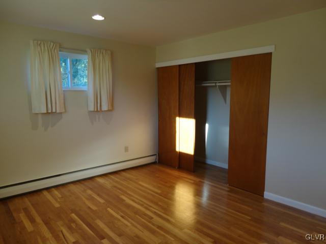 1230 Clearfield Road Nazareth, PA 18064 - Photo 17 of 20 an empty room with wooden floor and windows