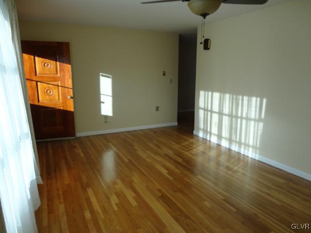 1230 Clearfield Road Nazareth, PA 18064 - Photo 20 of 20 a view of an empty room with wooden floor and a window