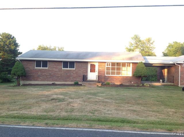 1230 Clearfield Road Nazareth, PA 18064 - Photo 2 of 20 a front view of a house with a garden