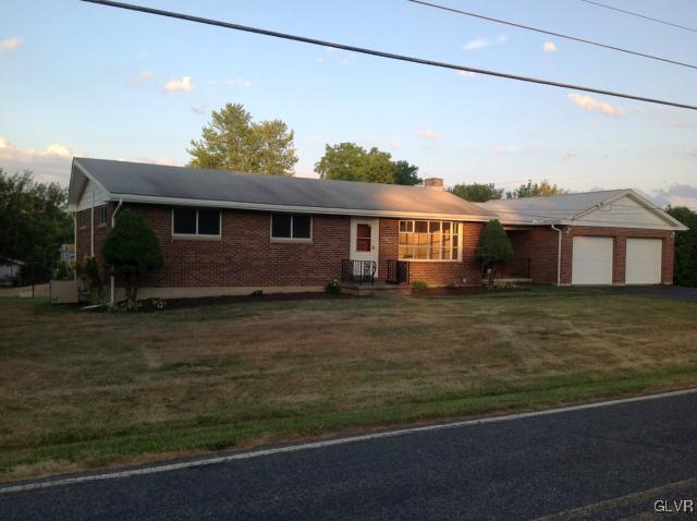 1230 Clearfield Road Nazareth, PA 18064 - Photo 5 of 20 a front view of a house with a garden