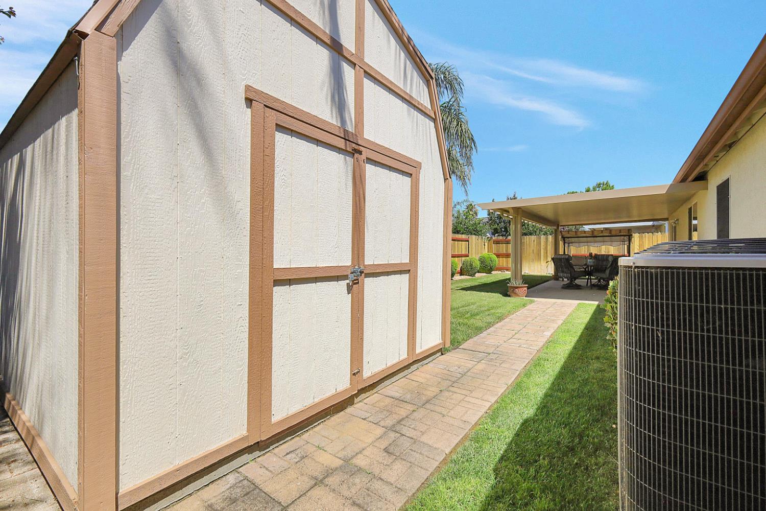 9840 Ellis Way Live Oak, CA 95953 - Photo 43 of 44 a view of a porch with wooden floor and a yard