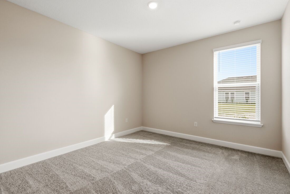 86654 Swift Launch Path Yulee, FL 32097 - Photo 16 of 31 an empty room with a window