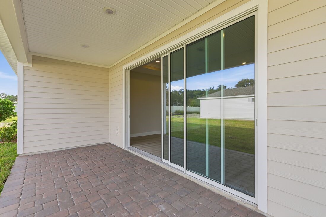 86654 Swift Launch Path Yulee, FL 32097 - Photo 26 of 31 a view of an empty room with a window