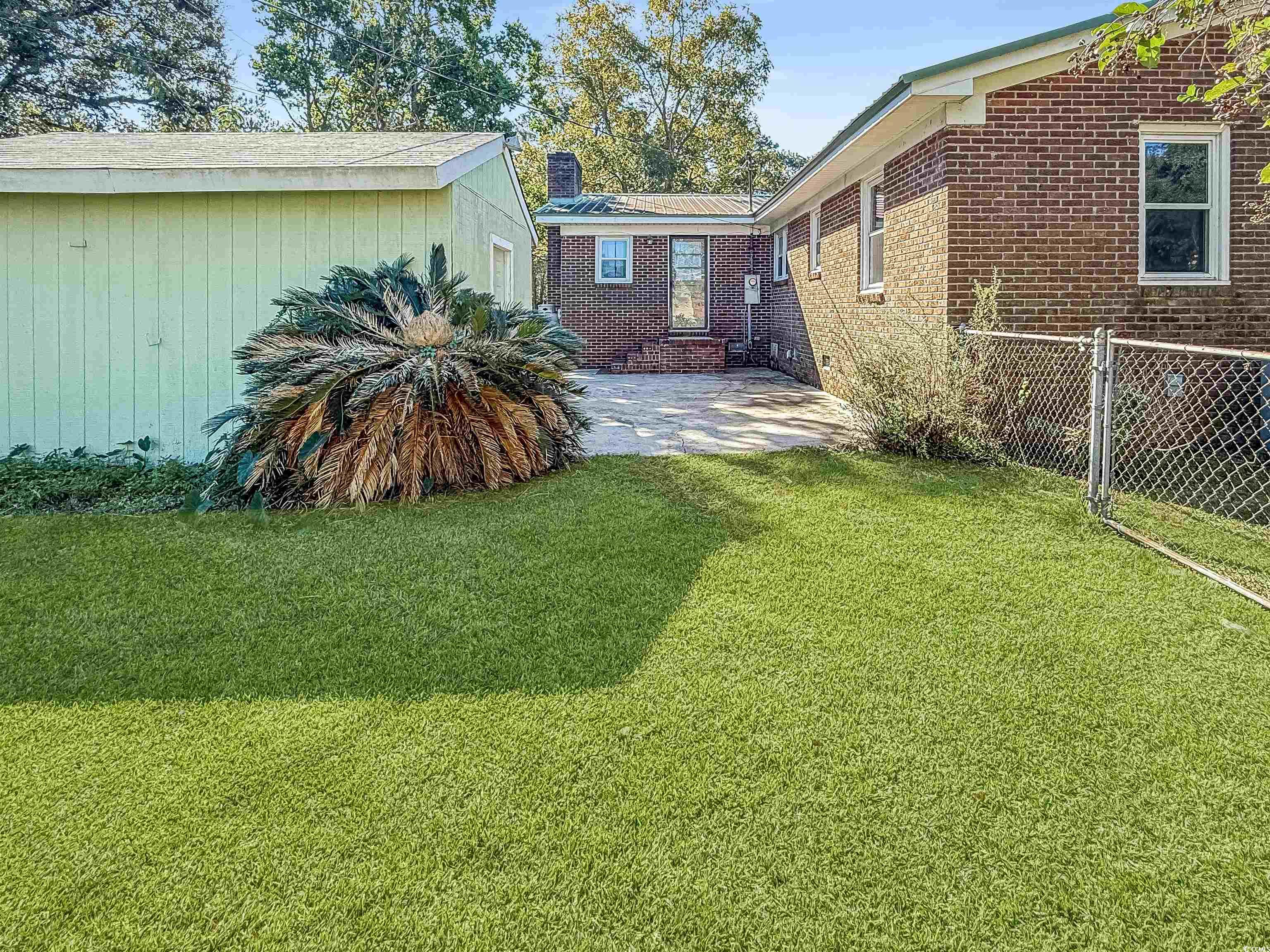 1682 Pickens Street Georgetown, SC 29440 - Photo 9 of 39 View of yard with a patio area