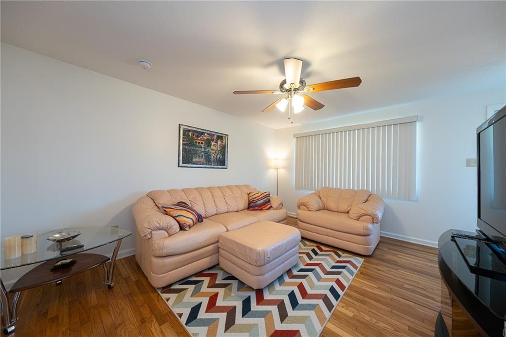 44 Highbury Road Cheswick, PA 15024 - Photo 3 of 36 BEAUTIFUL HARDWOOD FLOORS ENHANCE THIS NATURALLY BRIGHT LIVINGROOM.