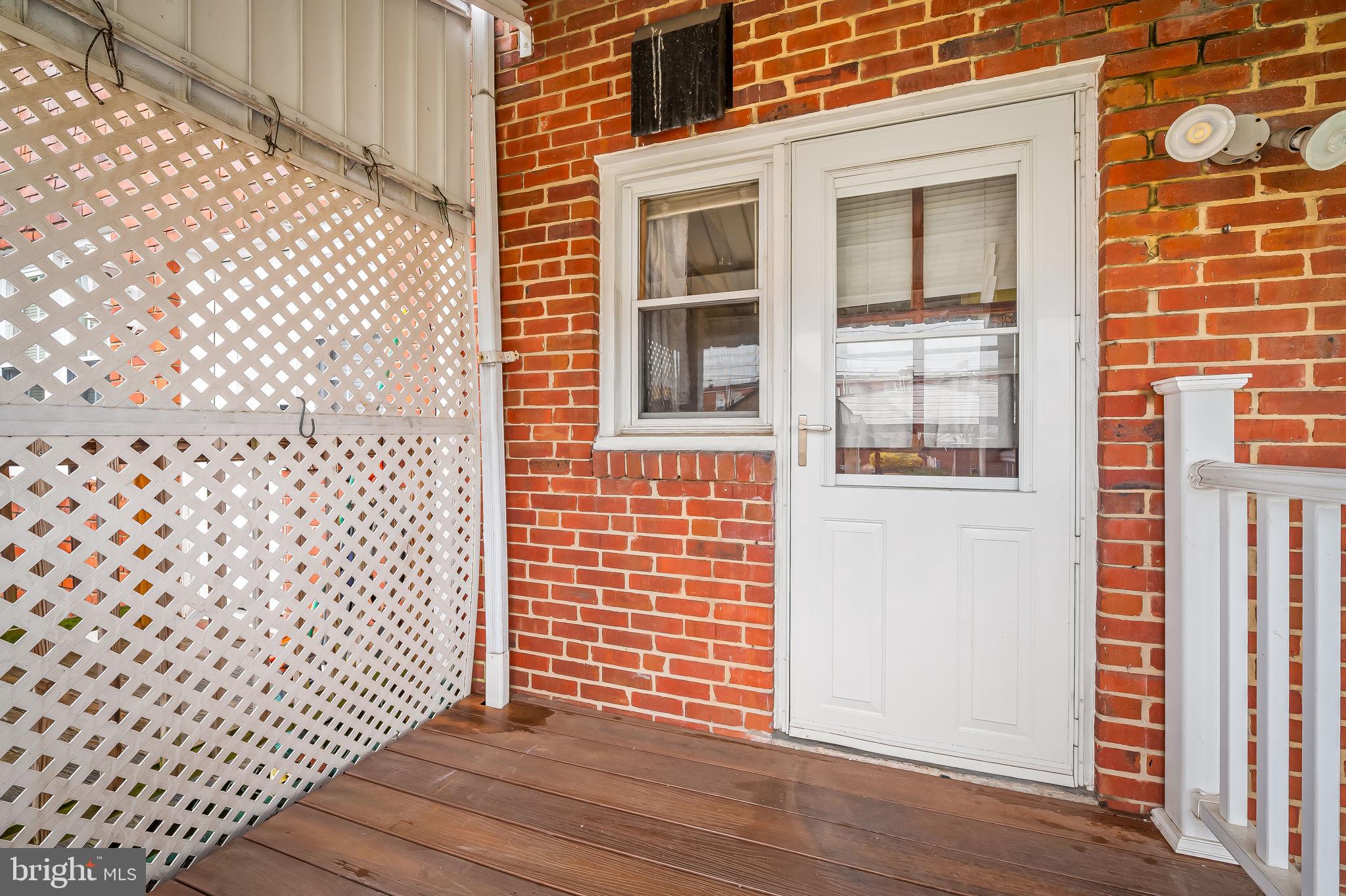 2857 Plainfield Road Baltimore, MD 21222 - Photo 29 of 32 front view of a brick house