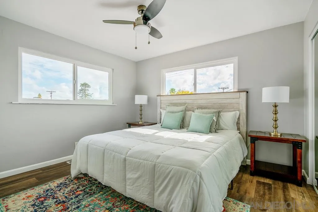 808 Leonard Avenue Oceanside, CA 92054 - Photo 18 of 25 a bedroom with a bed and a window