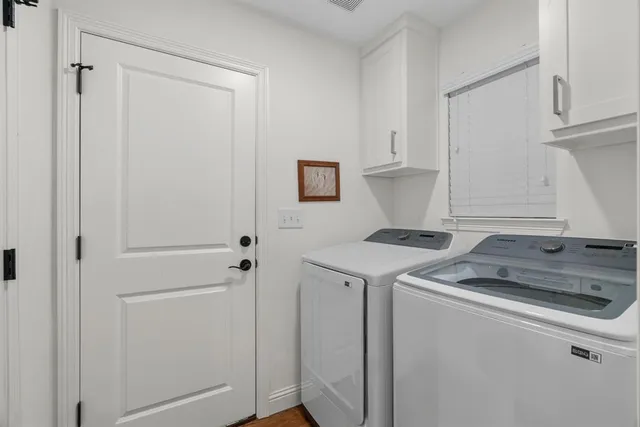 a kitchen with a stove and a refrigerator