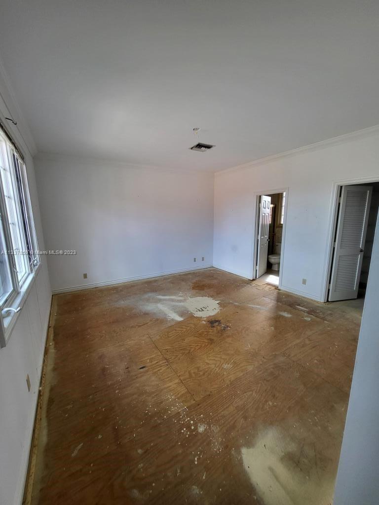 21249 Harrow Court Boca Raton, FL 33433 - Photo 12 of 18 an empty room with windows