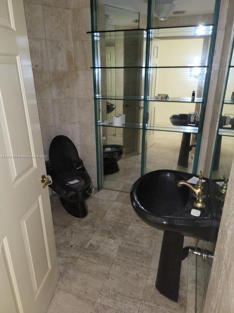 21249 Harrow Court Boca Raton, FL 33433 - Photo 16 of 18 a kitchen with a sink and a refrigerator
