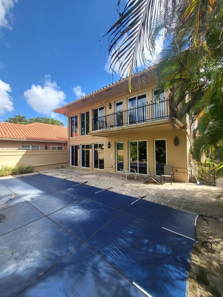 21249 Harrow Court Boca Raton, FL 33433 - Photo 2 of 18 a front view of a house with a yard