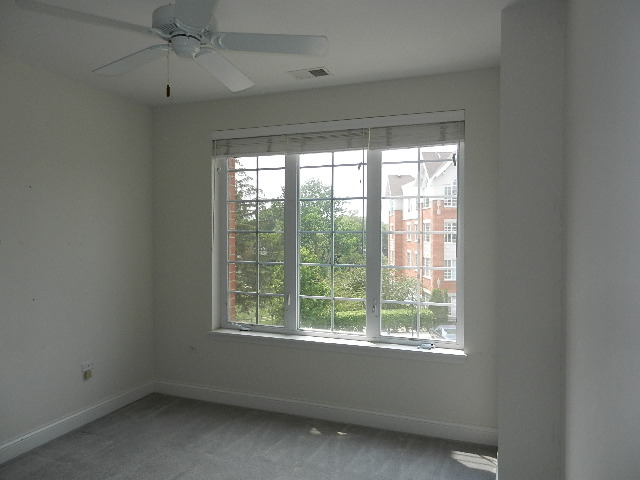 620 McHenry Road, Unit 303 Wheeling, IL 60090 - Photo 11 of 18 a view of an empty room with a window
