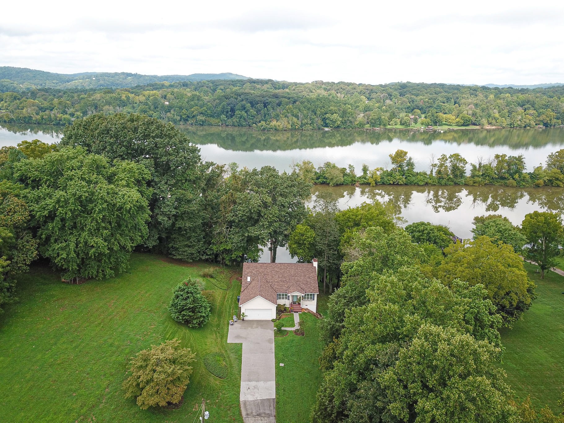 275 Matlock Shores Road Loudon, TN 37774 - Photo 4 of 36 a view of a lake with a mountain