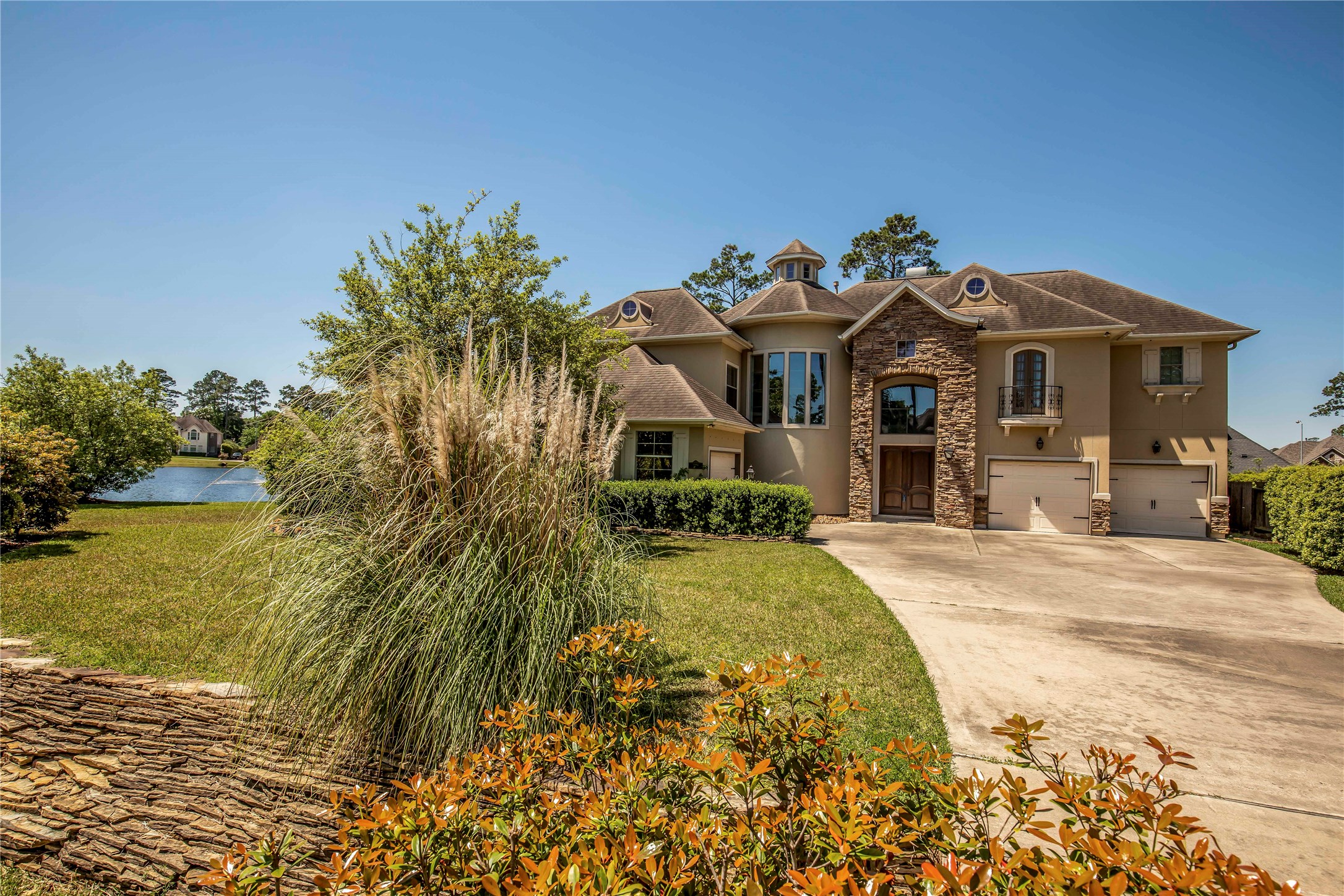 25219 Hideaway Run Drive Spring, TX 77389 - Photo 2 of 45 a front view of a house with a yard