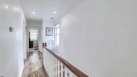 a view of hallway with stairs