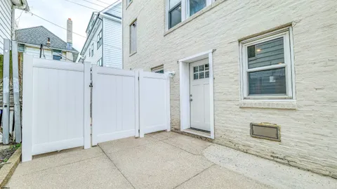 a view of a house with a glass door