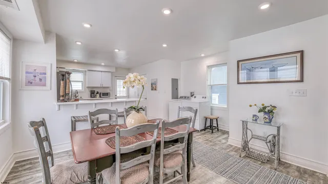 a view of a dining room with furniture