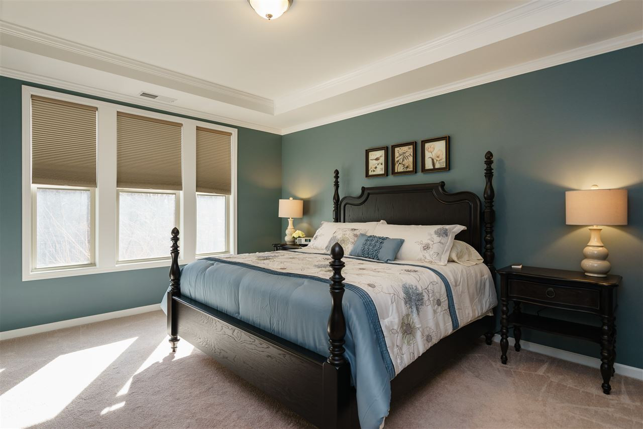 1533 Fullerton Place Raleigh, NC 27607 - Photo 12 of 25 SPACIOUS MASTER BEDROOM ON FIRST FLOOR OF HOME---BEAUTIFUL NATURAL LIGHTING OVERLOOKING THE WOODS, TRAY CEILING, CONNECTING MASTER BATHROOM AND WIC. MASTER BEDROOM