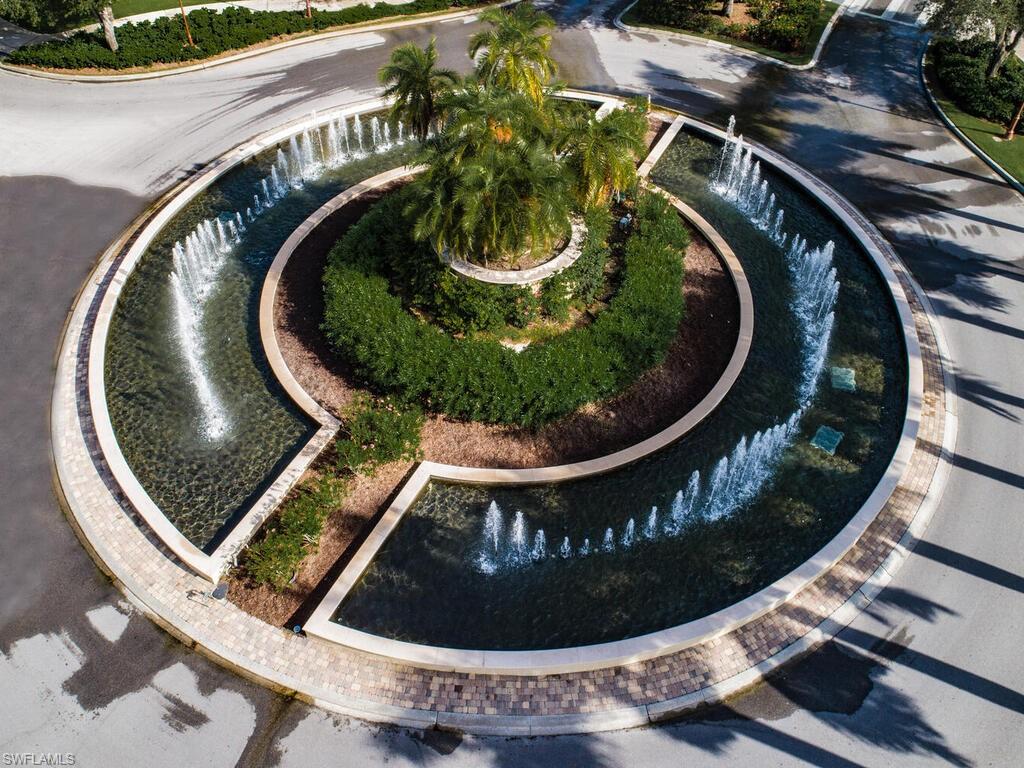 9115 Napoli Court, Unit 101 Naples, FL 34113 - Photo 30 of 49 an aerial view of a house with swimming pool and outdoor space