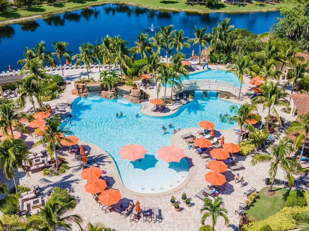 9115 Napoli Court, Unit 101 Naples, FL 34113 - Photo 34 of 49 an aerial view of a house swimming pool and outdoor seating