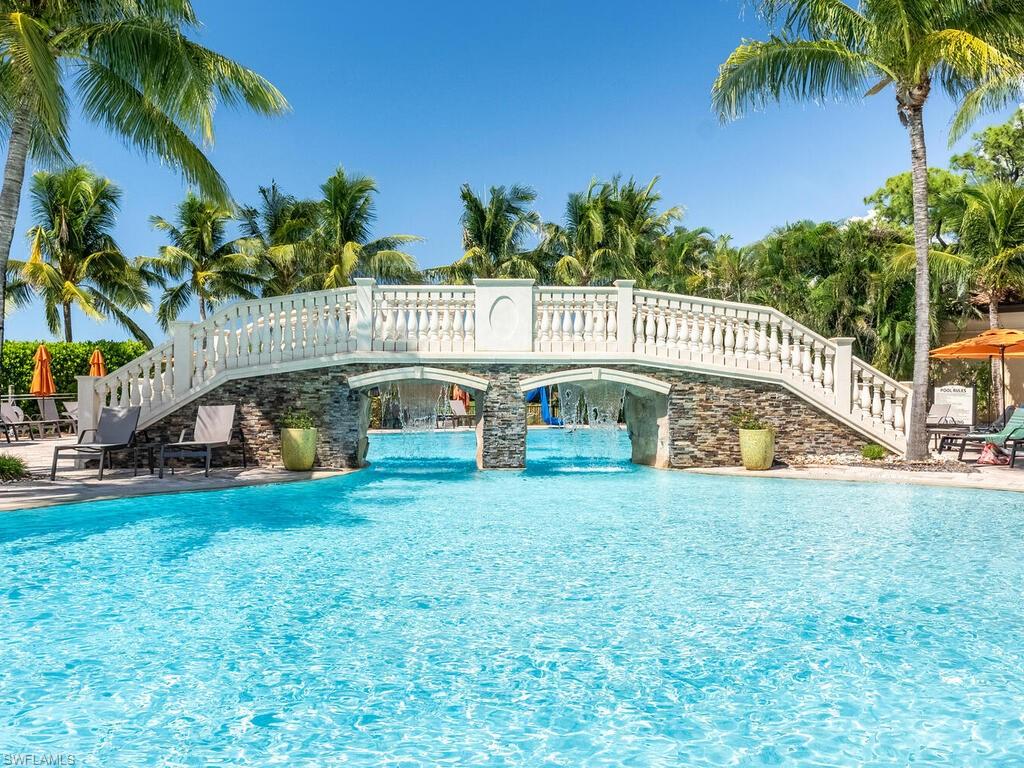 9115 Napoli Court, Unit 101 Naples, FL 34113 - Photo 36 of 49 a view of a house with swimming pool and porch