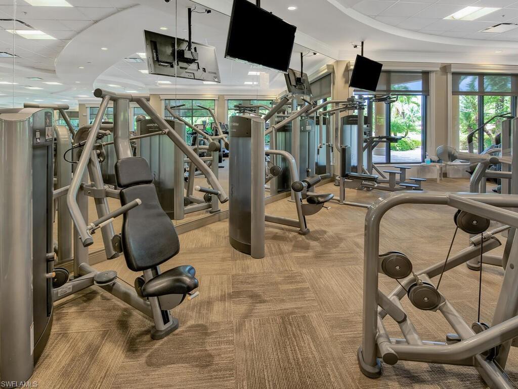 9115 Napoli Court, Unit 101 Naples, FL 34113 - Photo 40 of 49 a view of a room with gym equipment
