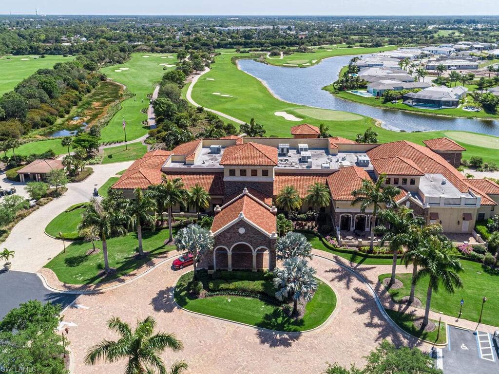 9115 Napoli Court, Unit 101 Naples, FL 34113 - Photo 43 of 49 an aerial view of residential houses with outdoor space and river